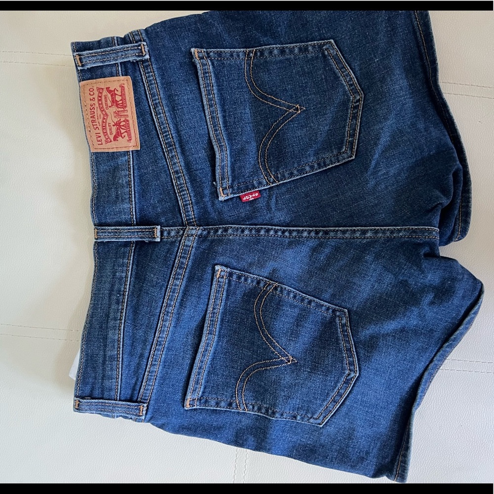 high waisted dark wash levi shorts